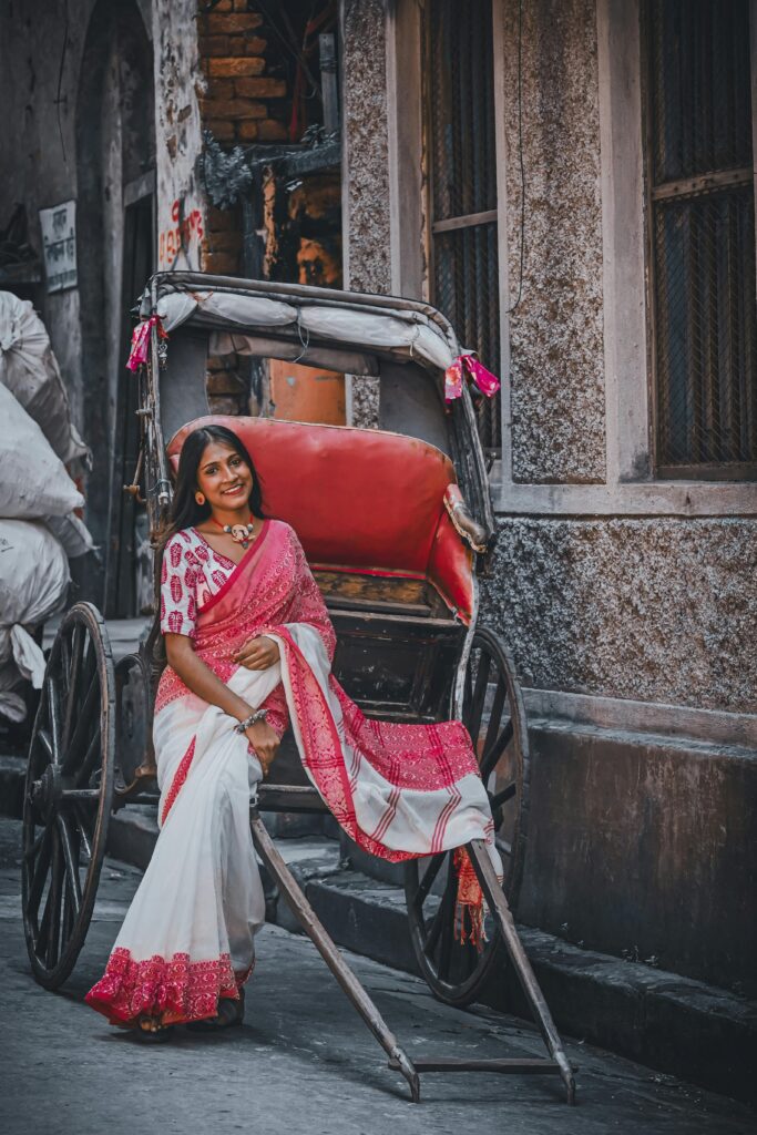 White and red mulmul saree